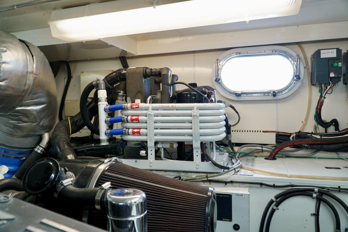 a machine with a large piece of equipment in it aboard MISS PATTI Yacht for Sale