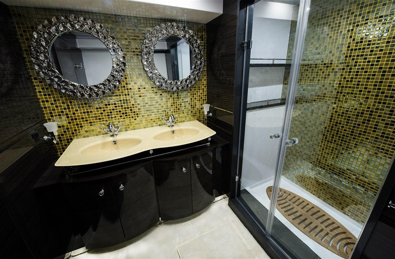 a bathroom with sinks and mirrors aboard CLOUDS Yacht for Sale