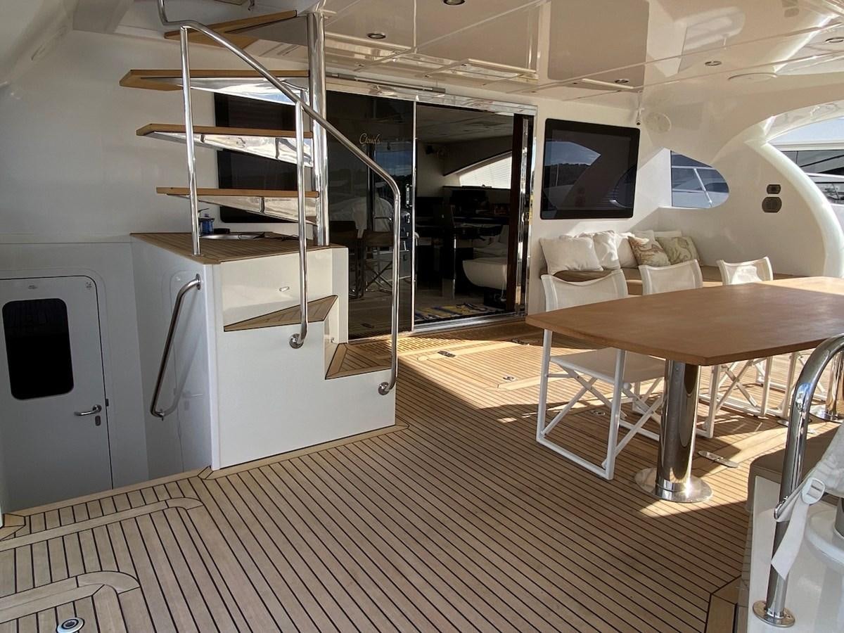 a room with a bunk bed and a desk aboard CLOUDS Yacht for Sale