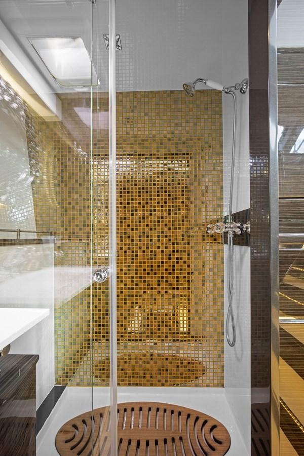 a shower unit in a bathroom aboard CLOUDS Yacht for Sale