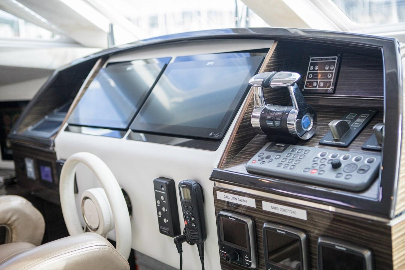 the inside of a car aboard CLOUDS Yacht for Sale