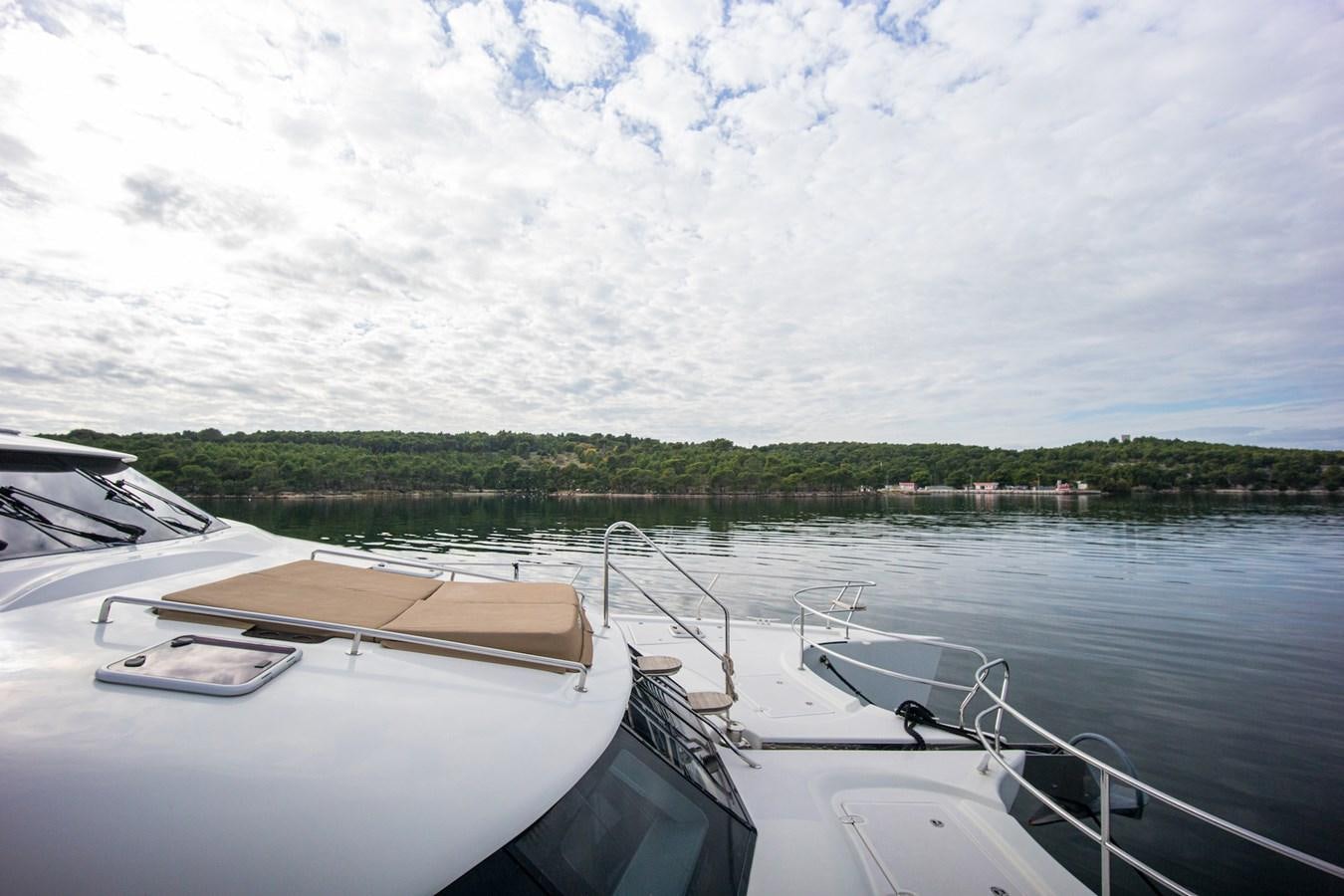 a boat on the water aboard CLOUDS Yacht for Sale