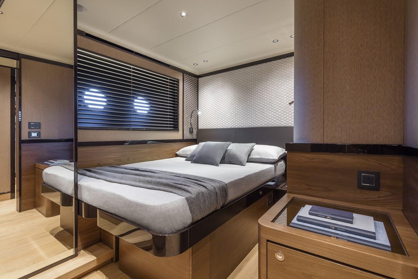 a bed in a room aboard 2025 ABSOLUTE NAVERTTA 68 Yacht for Sale