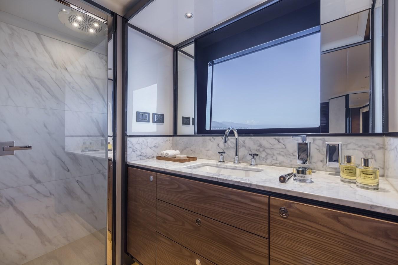 a bathroom with a sink and a large window aboard 2025 ABSOLUTE NAVERTTA 68 Yacht for Sale