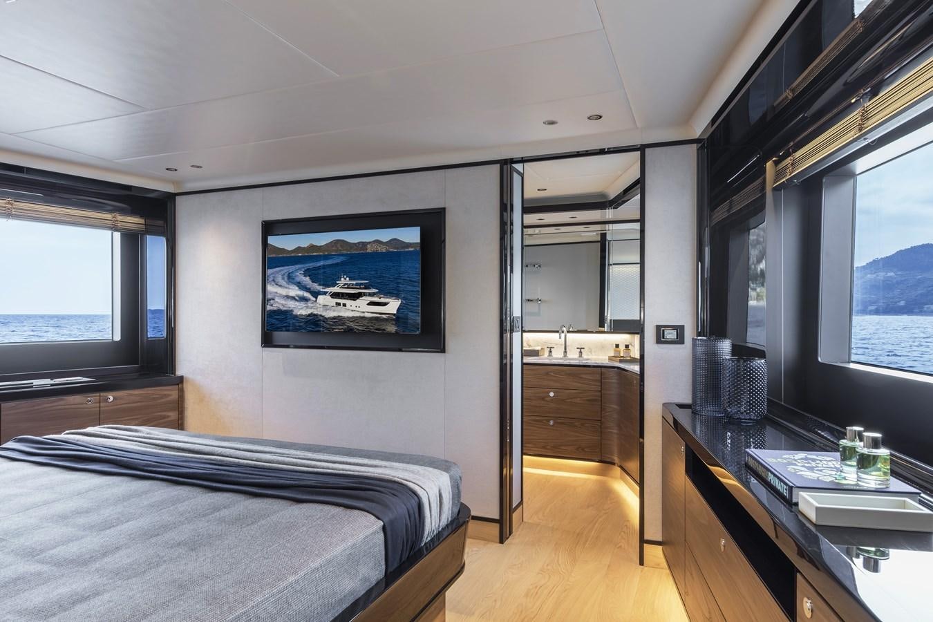 a bedroom with a large bed aboard 2025 ABSOLUTE NAVERTTA 68 Yacht for Sale
