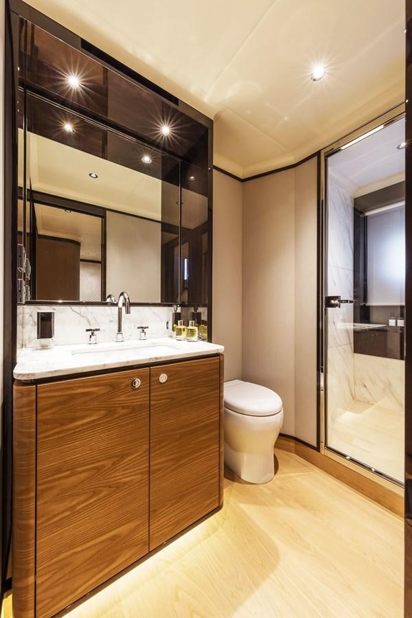 a bathroom with a large mirror aboard 2025 ABSOLUTE NAVERTTA 68 Yacht for Sale