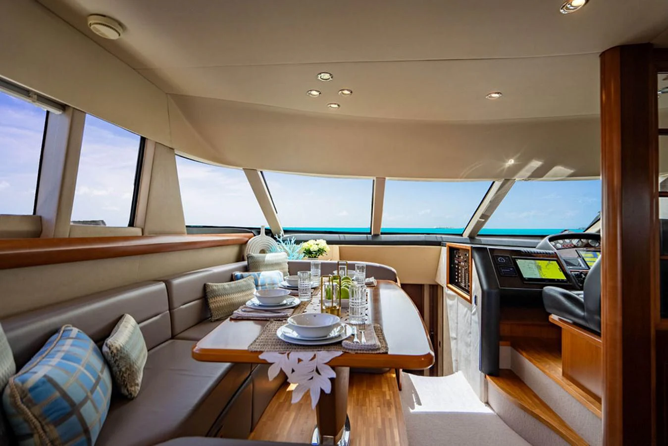 a table in a room aboard EMPIRE SUN Yacht for Sale