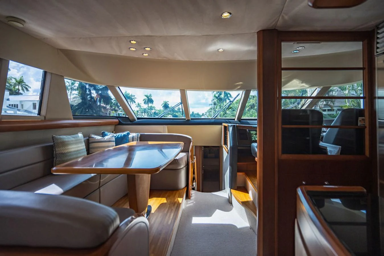 a bus with a table and chairs aboard EMPIRE SUN Yacht for Sale