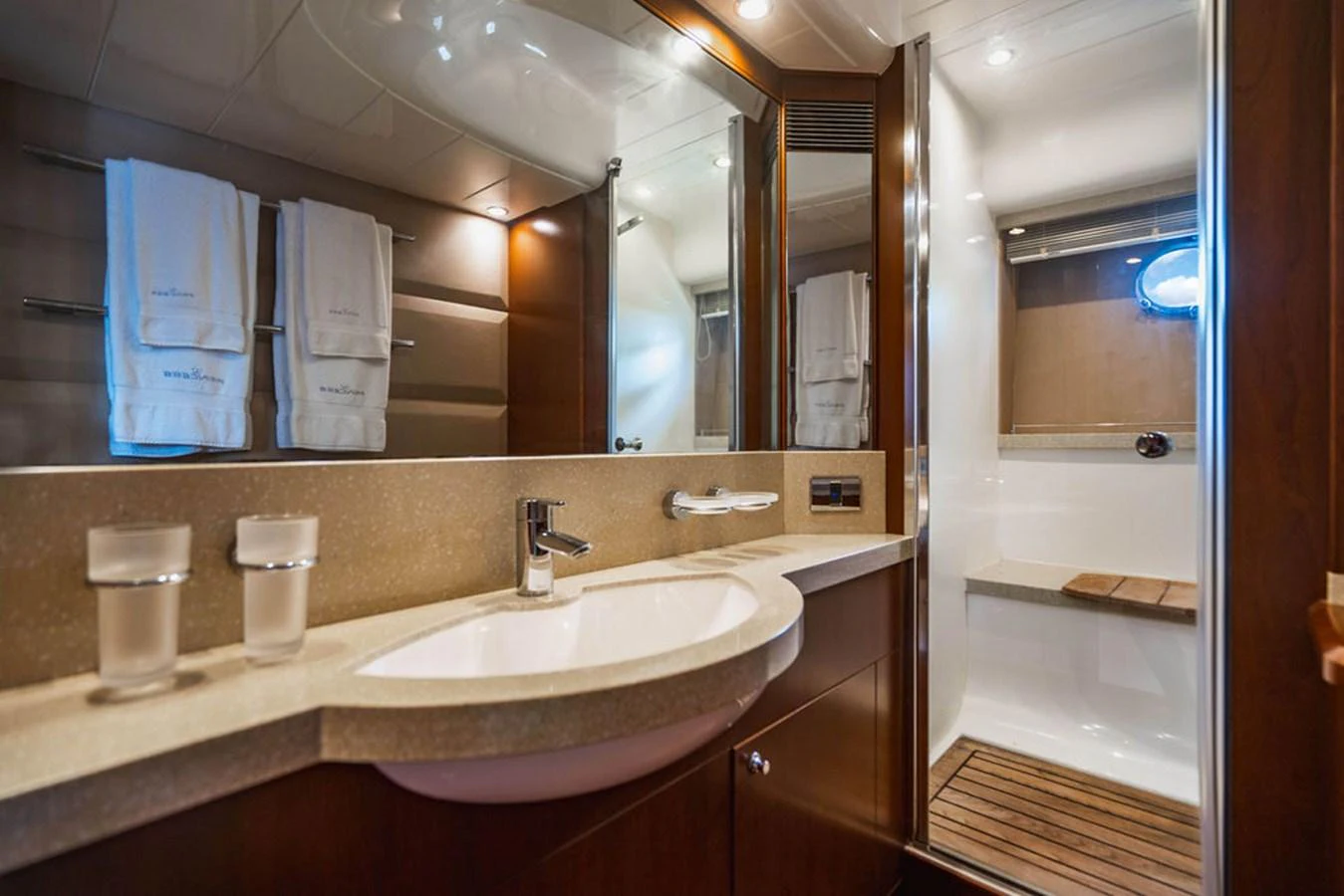 a bathroom with a large mirror aboard EMPIRE SUN Yacht for Sale