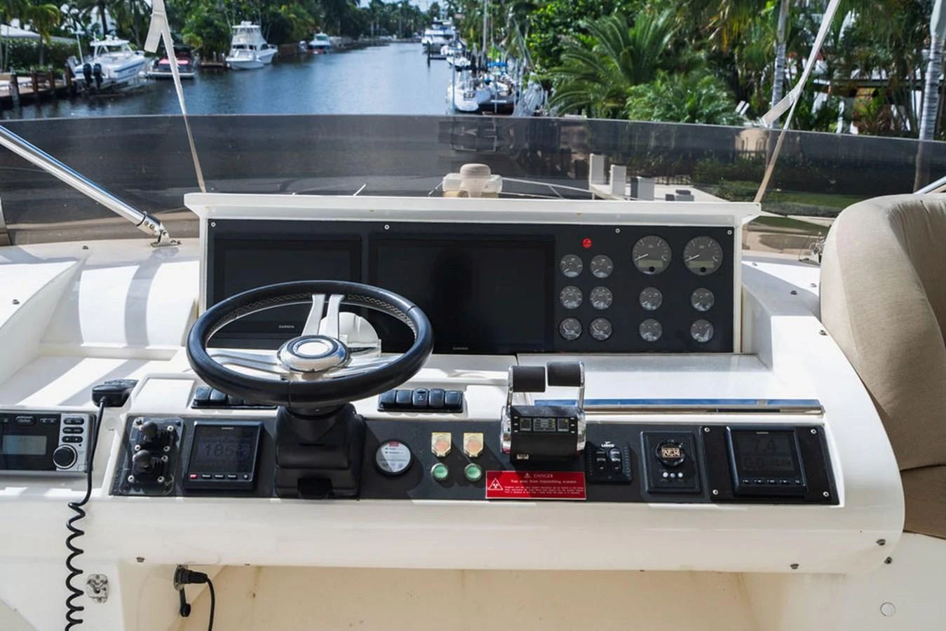 a car with a steering wheel aboard EMPIRE SUN Yacht for Sale