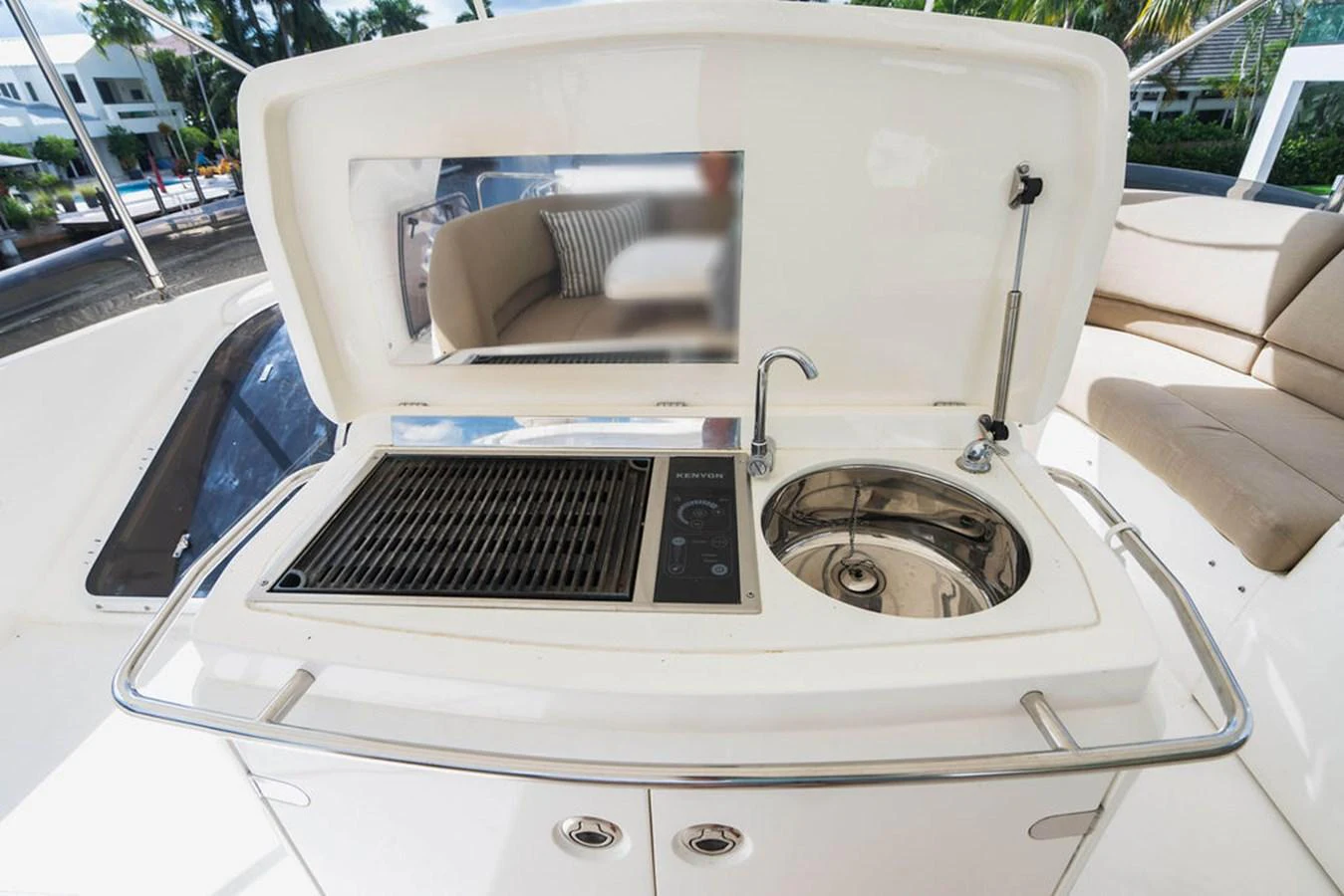 a white car with a toaster oven and a toaster on the front aboard EMPIRE SUN Yacht for Sale