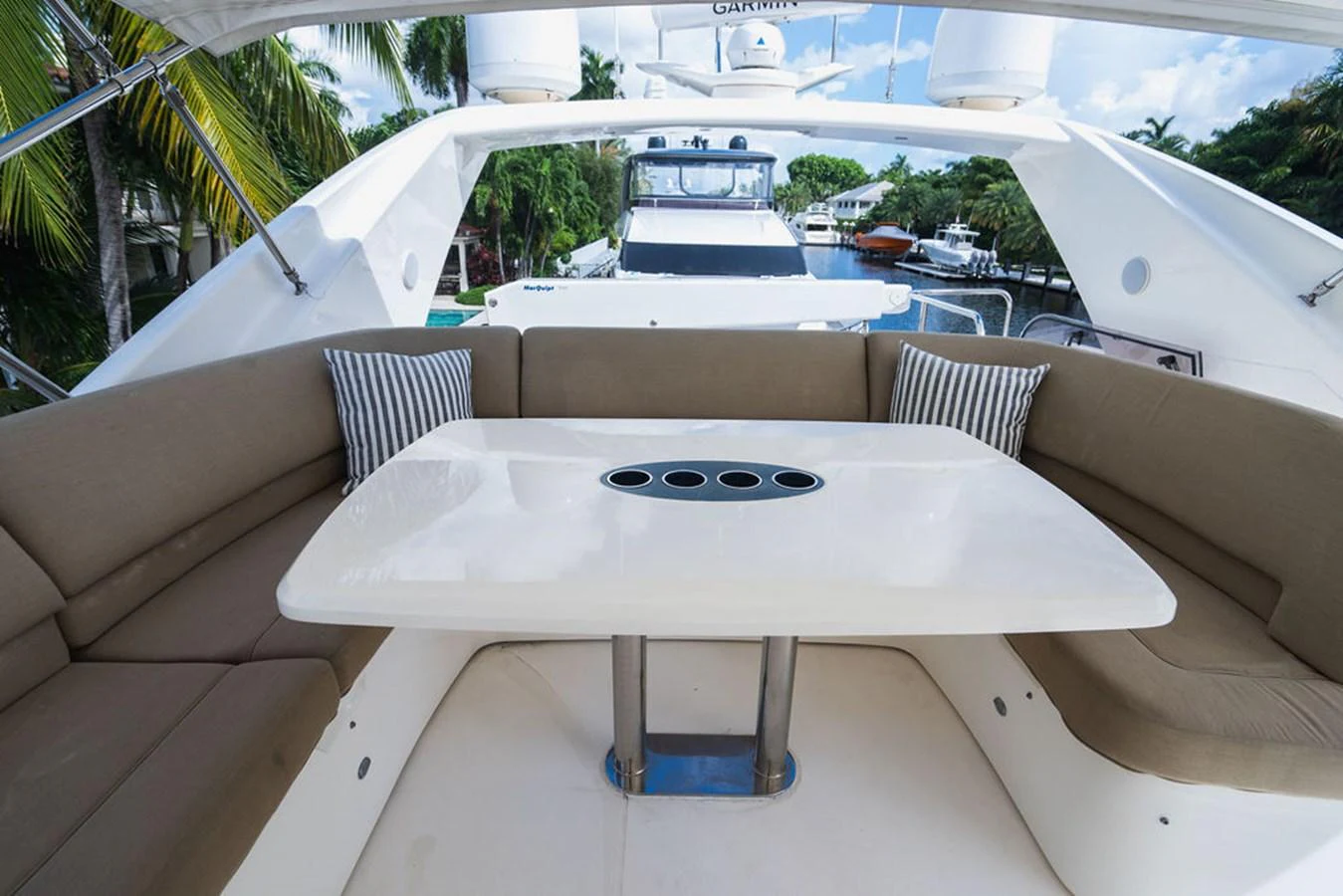 a table on a patio aboard EMPIRE SUN Yacht for Sale