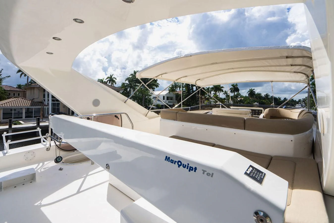 a white boat on a deck aboard EMPIRE SUN Yacht for Sale