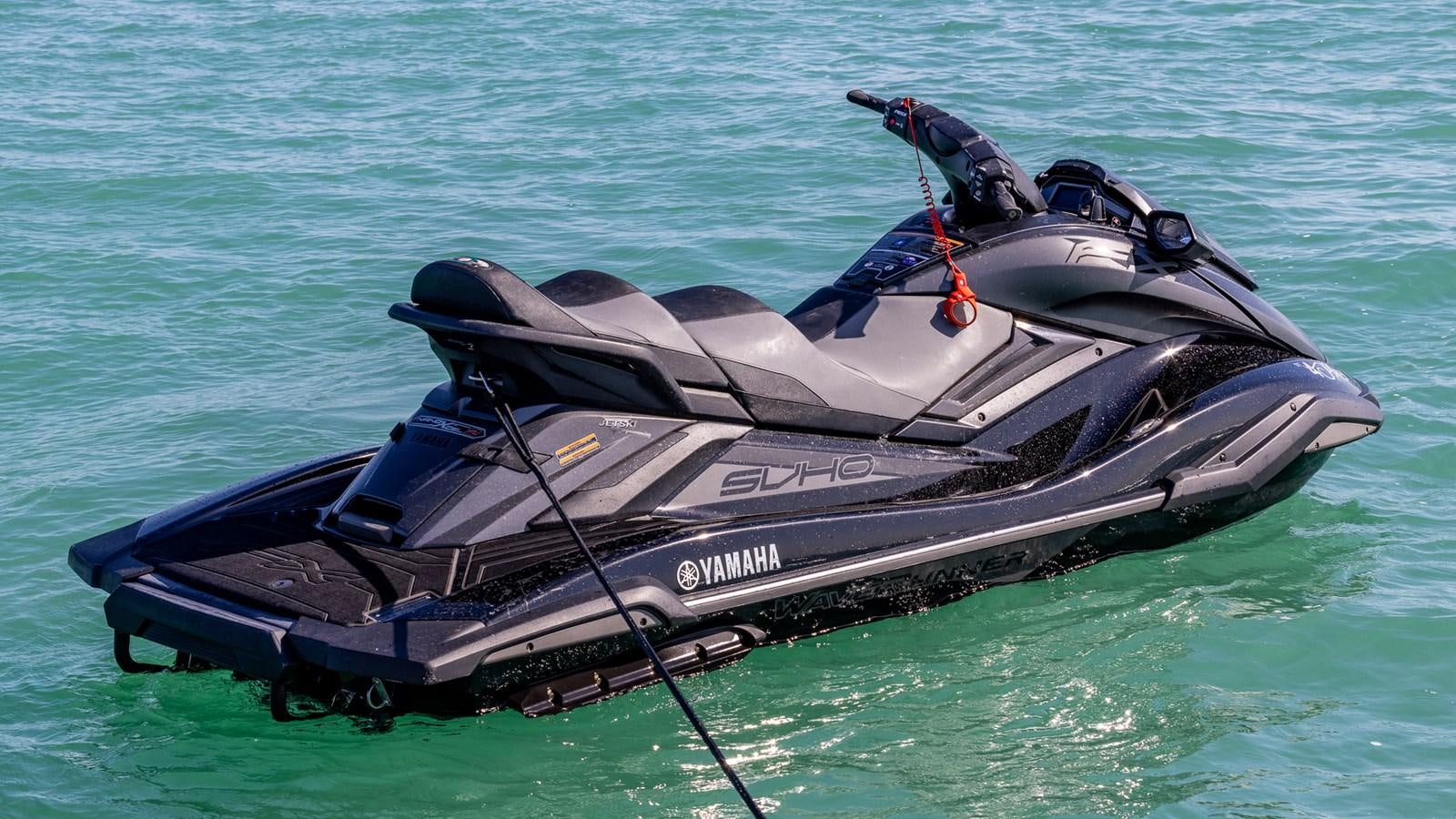 a black and silver boat in the water aboard 4 PLAY Yacht for Sale