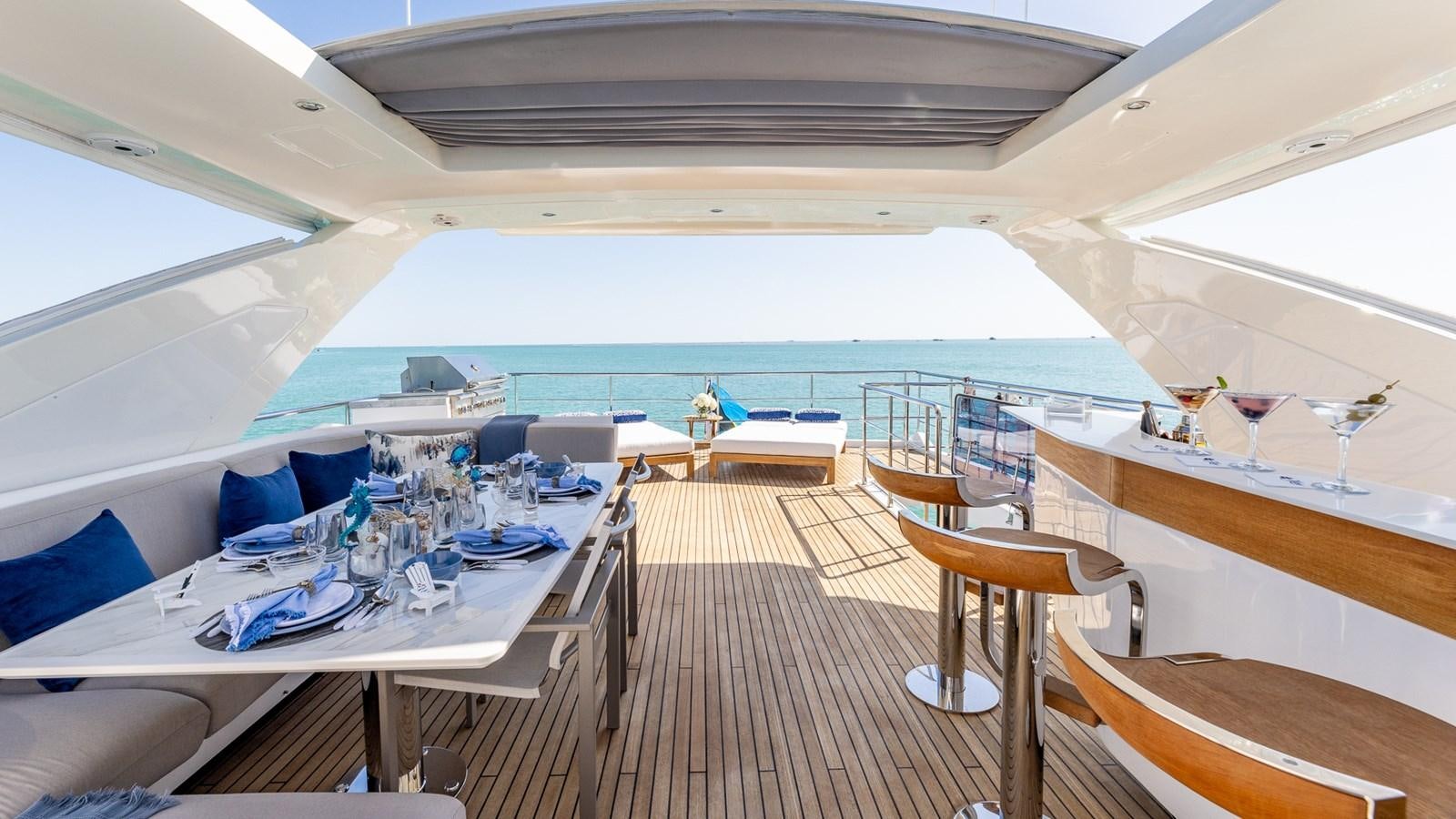a boat with tables and chairs aboard 4 PLAY Yacht for Sale