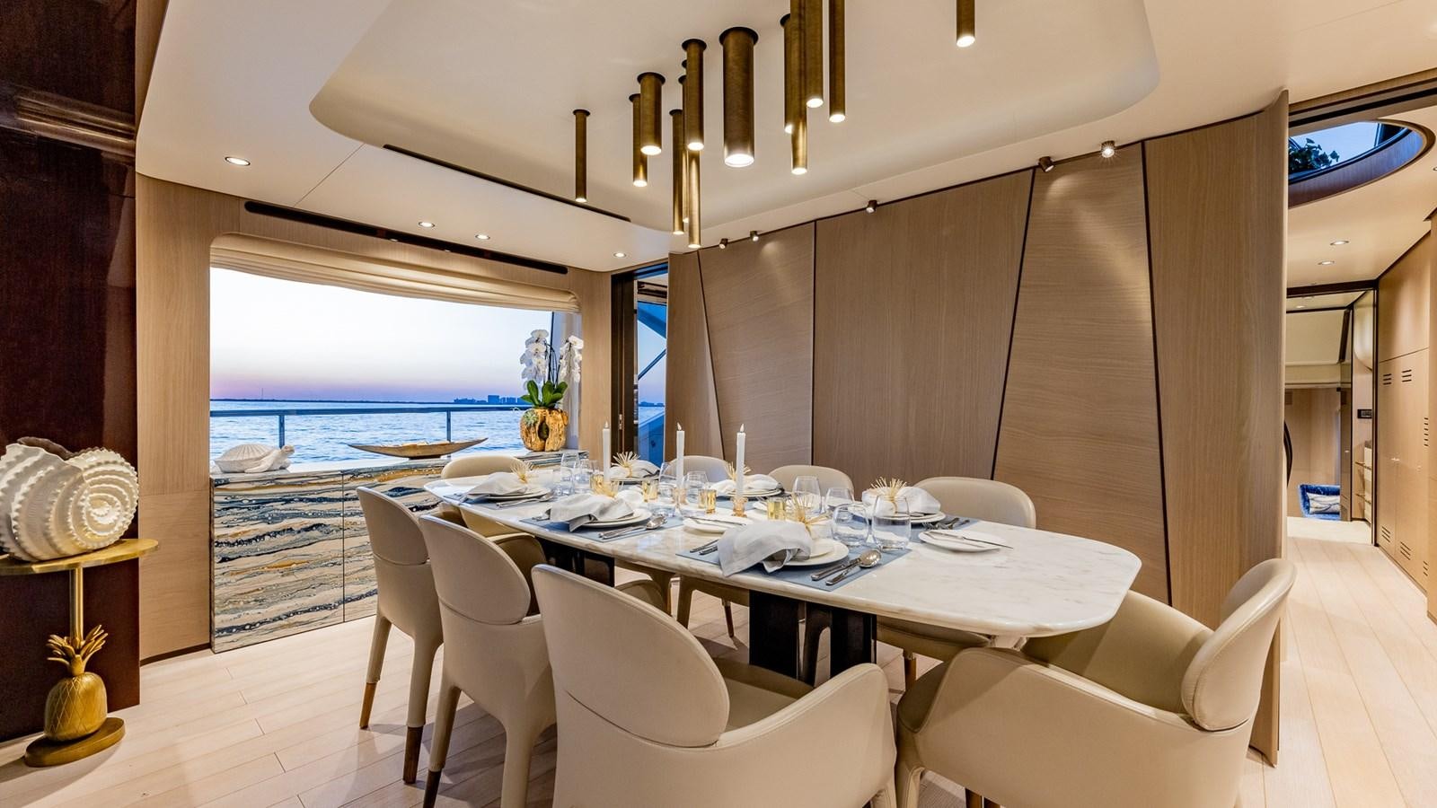 a dining table in a room aboard 4 PLAY Yacht for Sale
