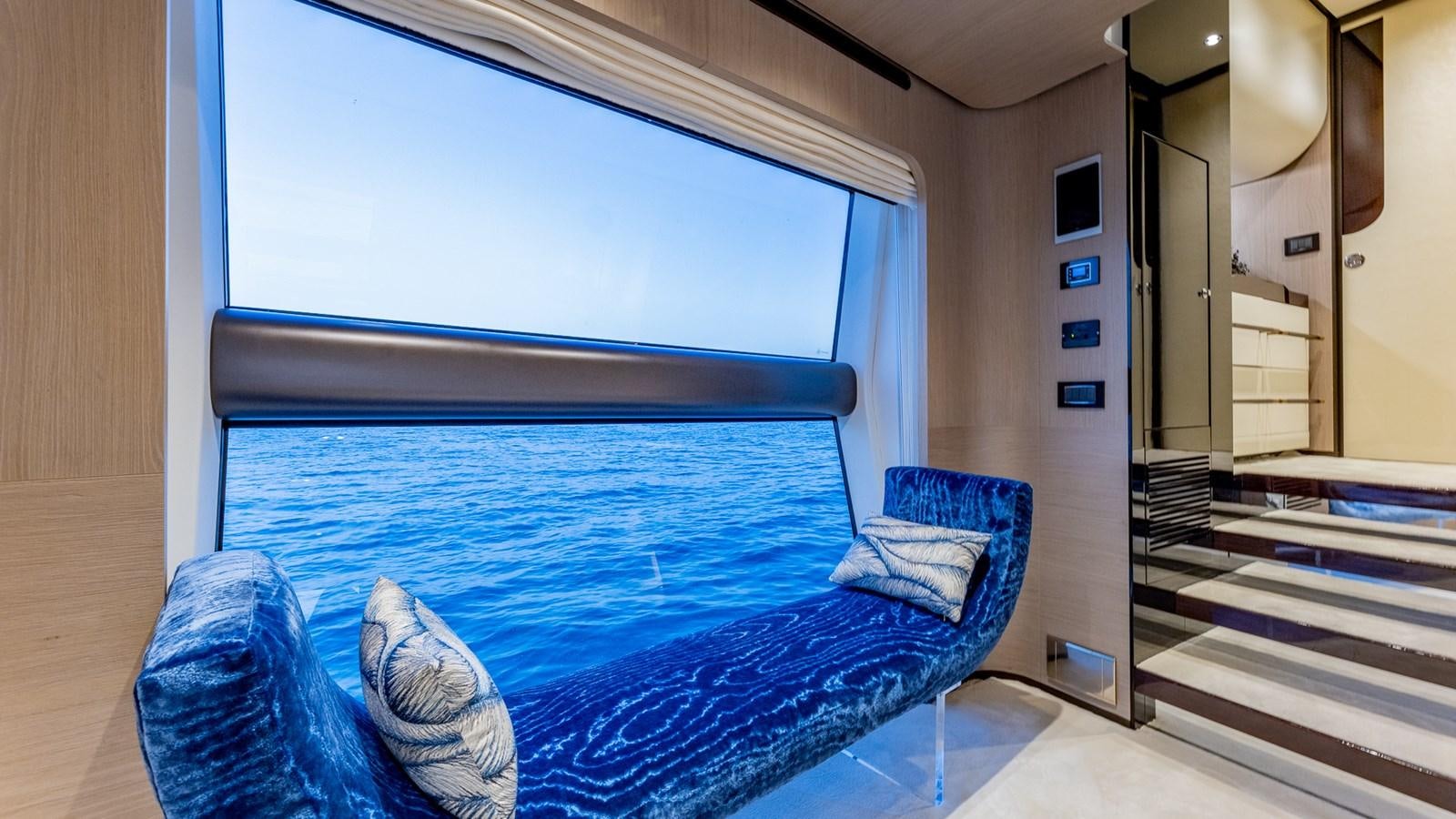 a blue bed in a room aboard 4 PLAY Yacht for Sale
