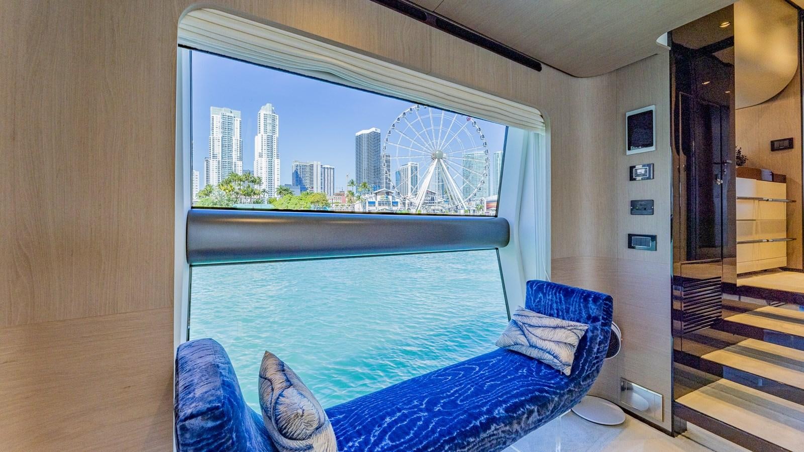 a room with a large blue pool aboard 4 PLAY Yacht for Sale