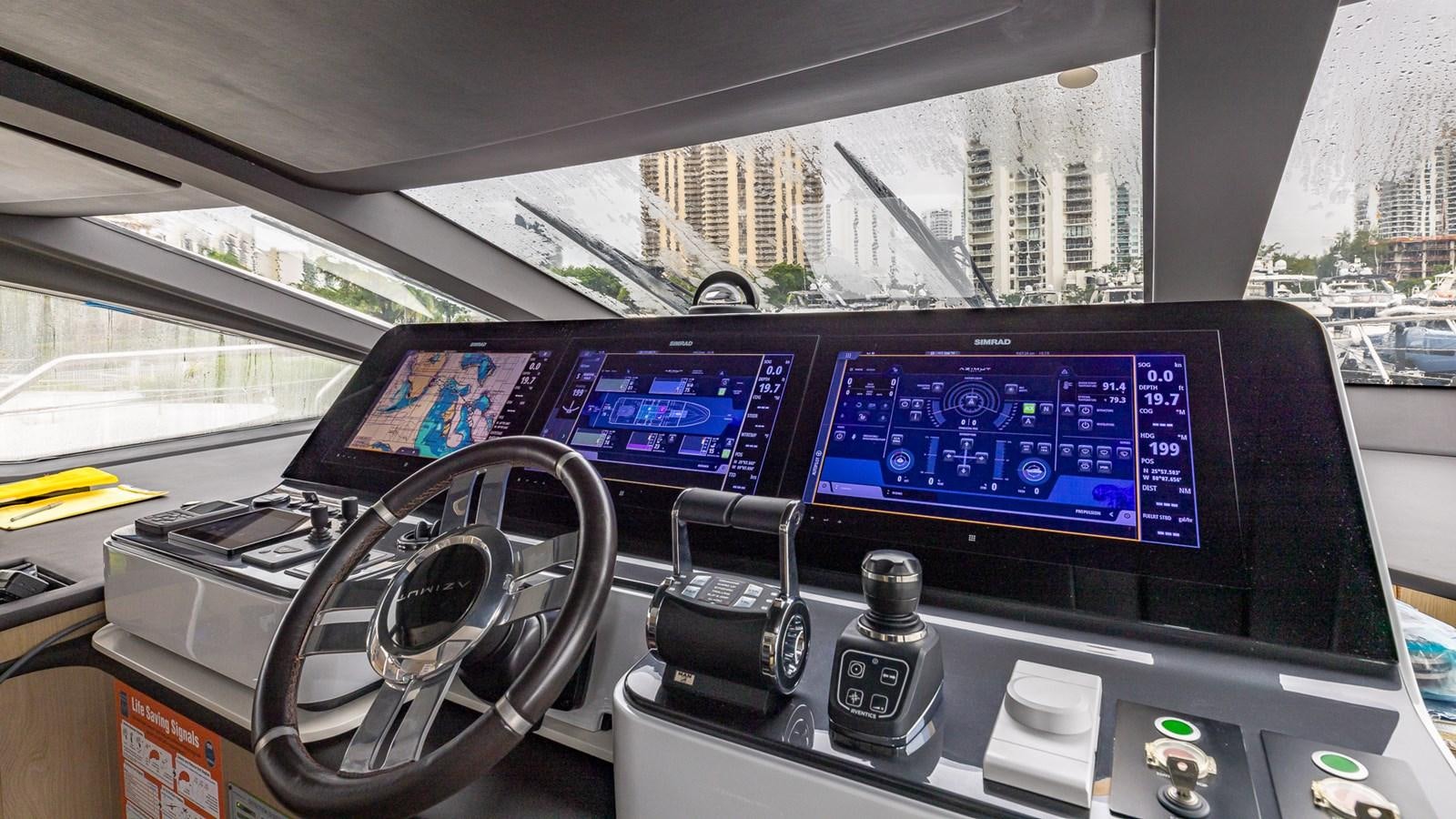 inside of a car aboard 4 PLAY Yacht for Sale