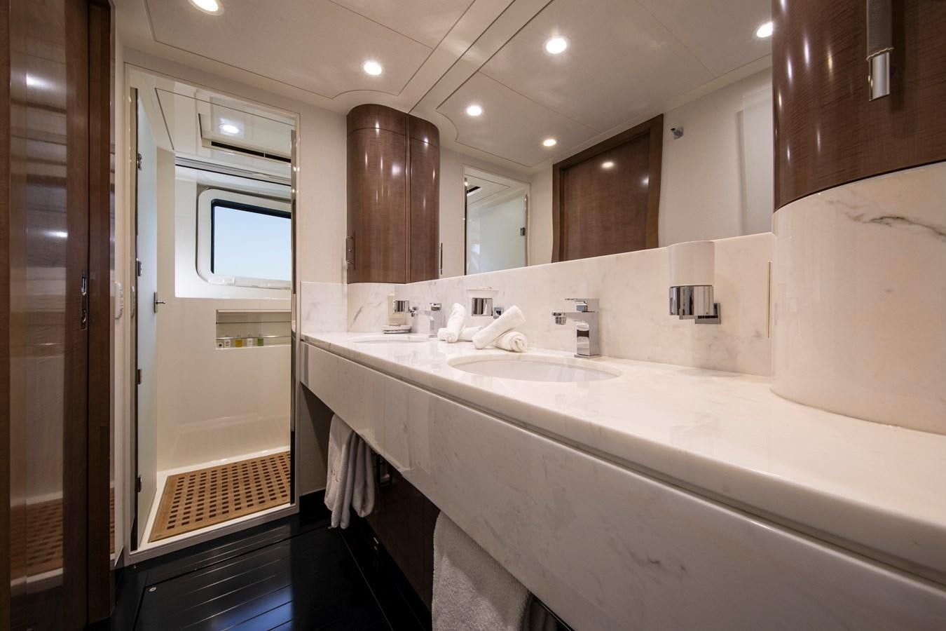 a bathroom with a large mirror aboard VALYRA Yacht for Sale