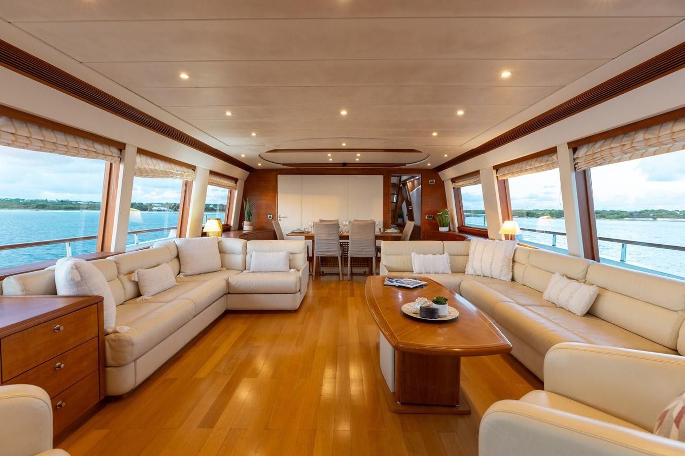 a living room with a large window aboard ECLIPSE Yacht for Sale