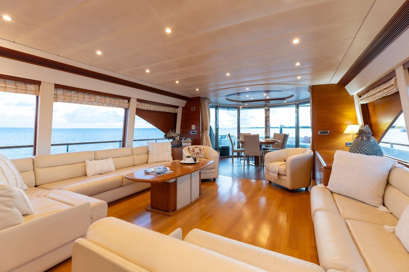 a living room with a large window aboard ECLIPSE Yacht for Sale