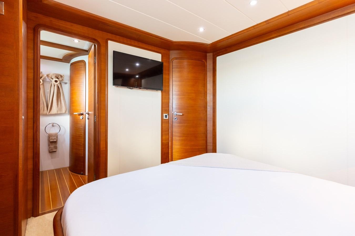 a hotel room with a bed aboard ECLIPSE Yacht for Sale