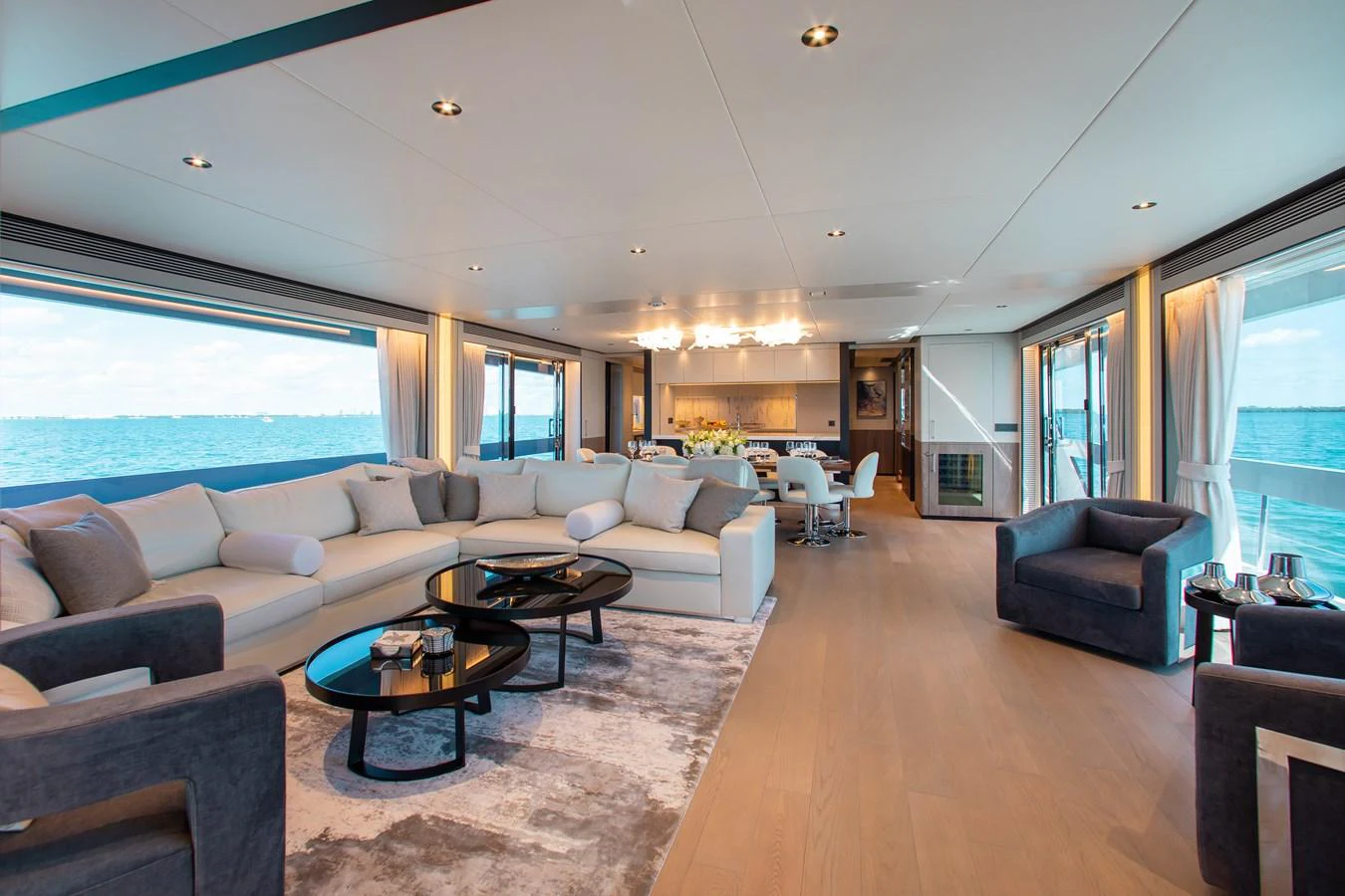a living room with a large window aboard CROWNED EAGLE Yacht for Sale