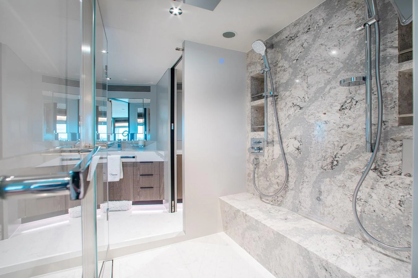 a bathroom with a large wall aboard CROWNED EAGLE Yacht for Sale