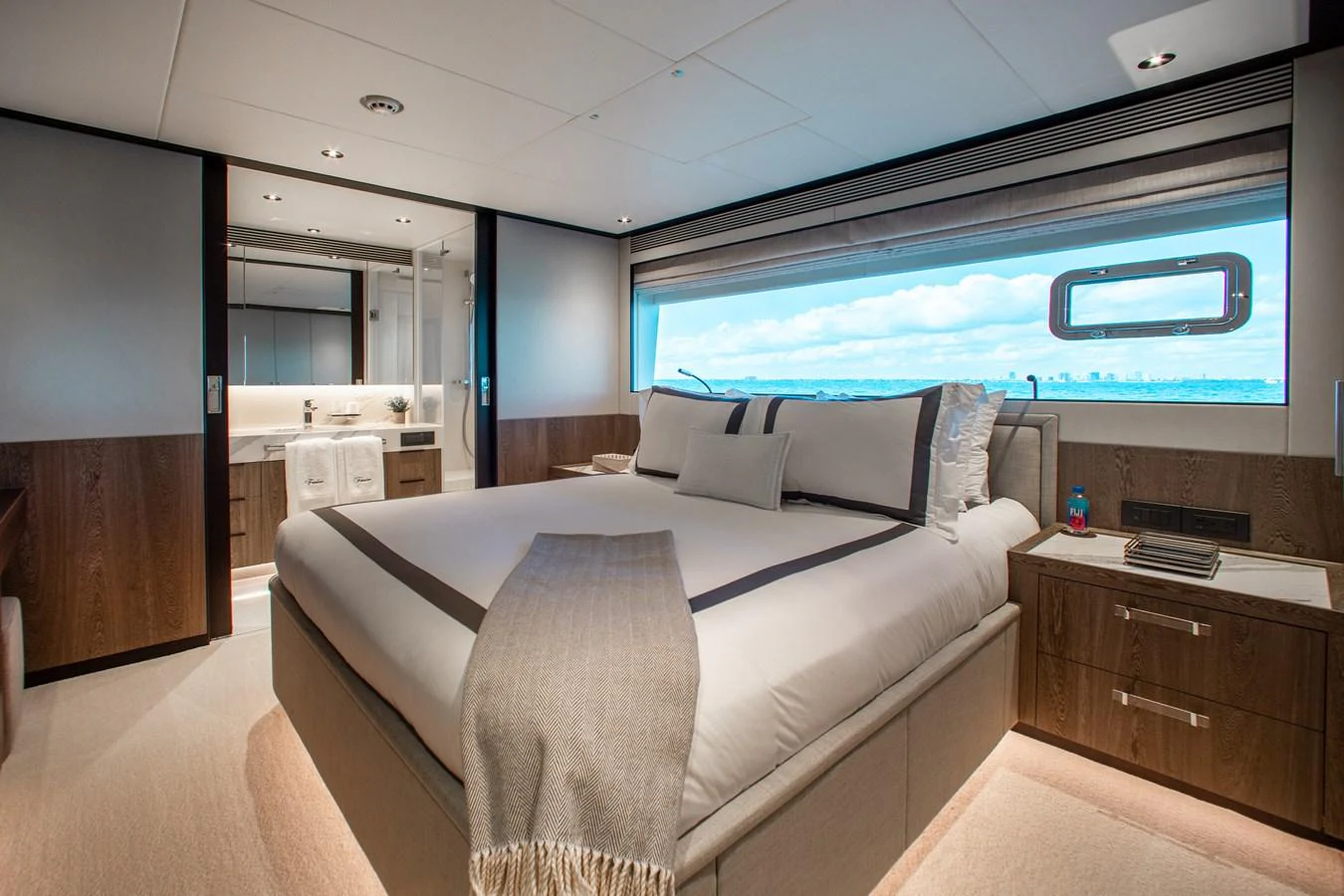 a bed in a room aboard CROWNED EAGLE Yacht for Sale