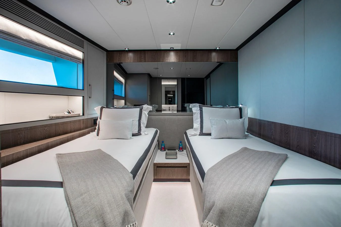 a room with a bed and a couch aboard CROWNED EAGLE Yacht for Sale