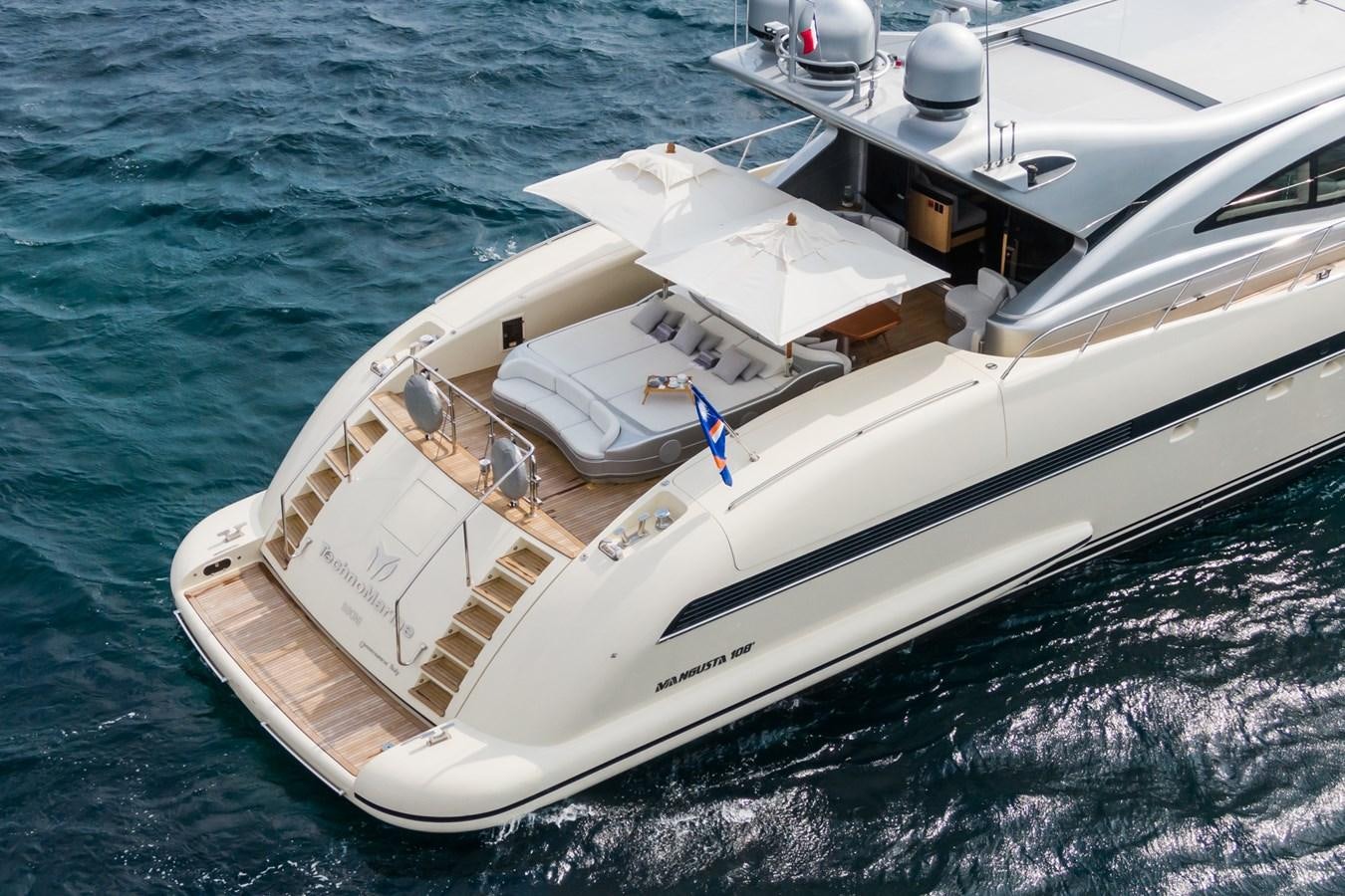 a boat on the water aboard MANGUSTA MAXI OPEN 108#23 - TECHNOMARINE - CAREFULLY USED Yacht for Sale