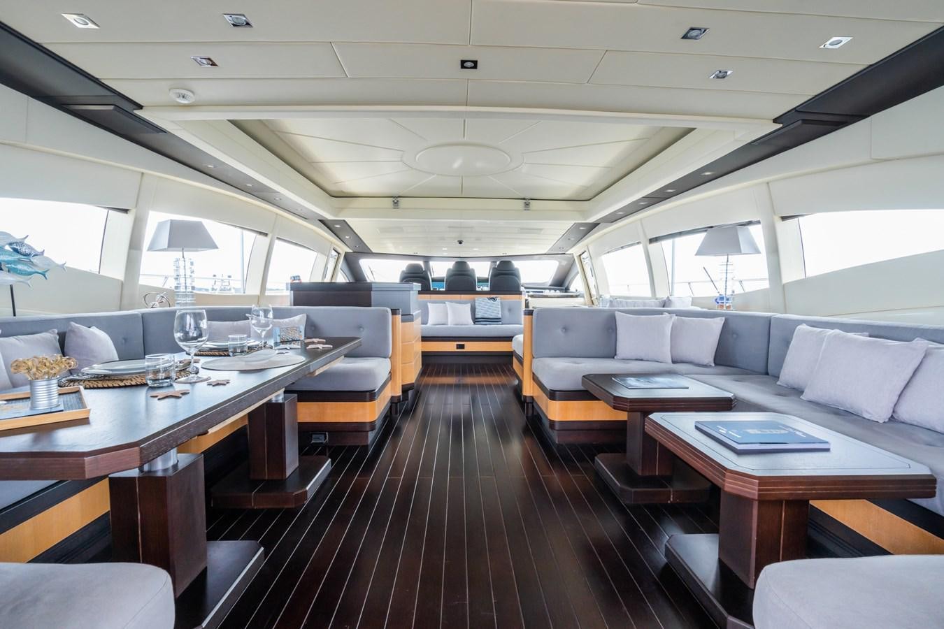a room with a wood floor and a wood floor aboard MANGUSTA MAXI OPEN 108#23 - TECHNOMARINE - CAREFULLY USED Yacht for Sale