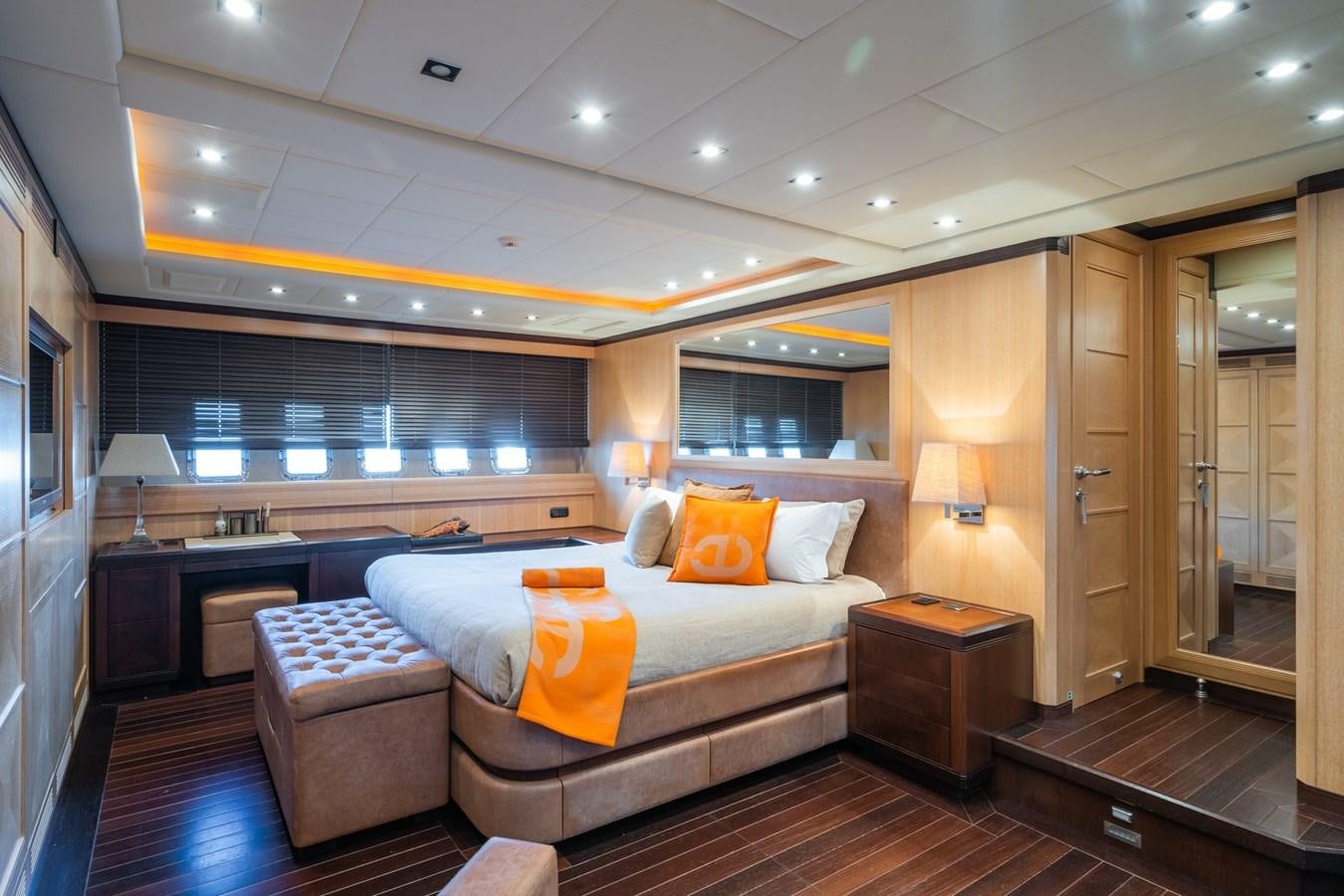 a large bedroom with a bed aboard MANGUSTA MAXI OPEN 108#23 - TECHNOMARINE - CAREFULLY USED Yacht for Sale