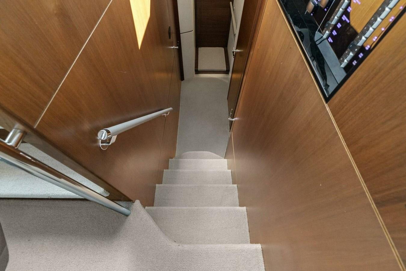 a flight of stairs leading to a door aboard AMARULA SUN Yacht for Sale