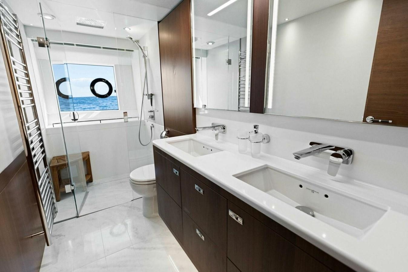 a bathroom with a sink and a toilet aboard AMARULA SUN Yacht for Sale