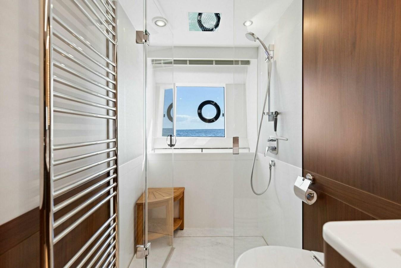 a bathroom with a shower unit aboard AMARULA SUN Yacht for Sale