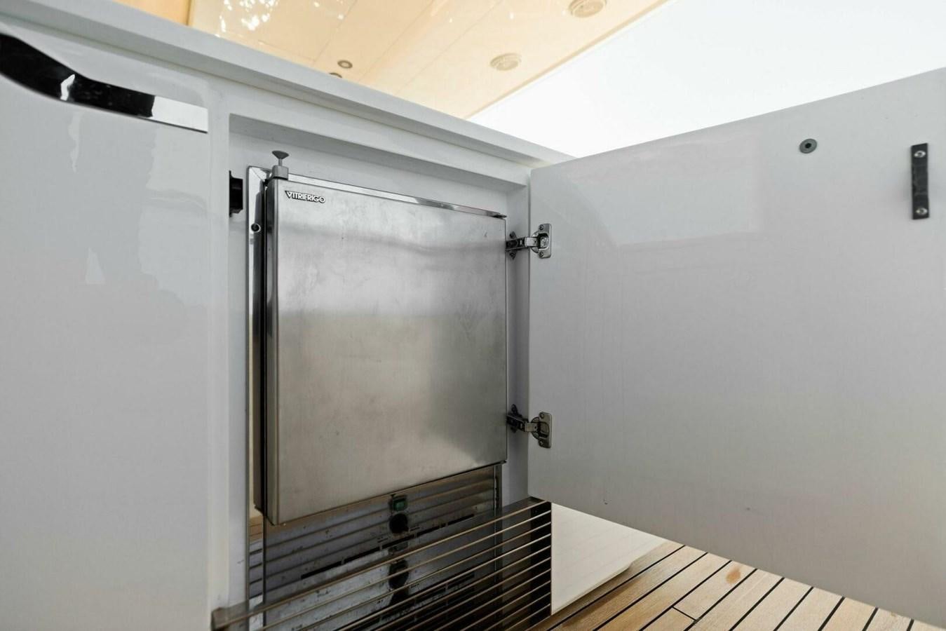 a large silver refrigerator aboard AMARULA SUN Yacht for Sale