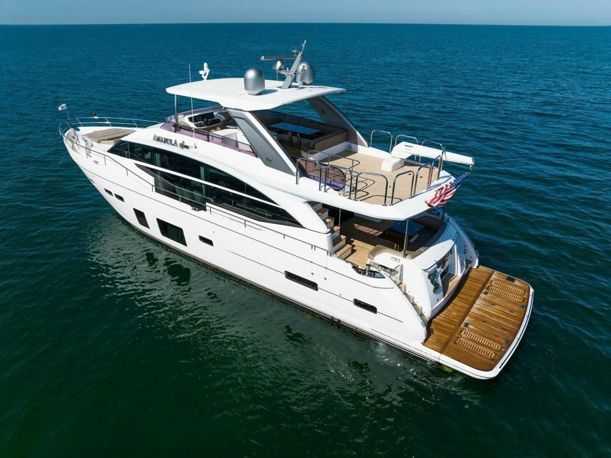 a large white boat in the water aboard AMARULA SUN Yacht for Sale