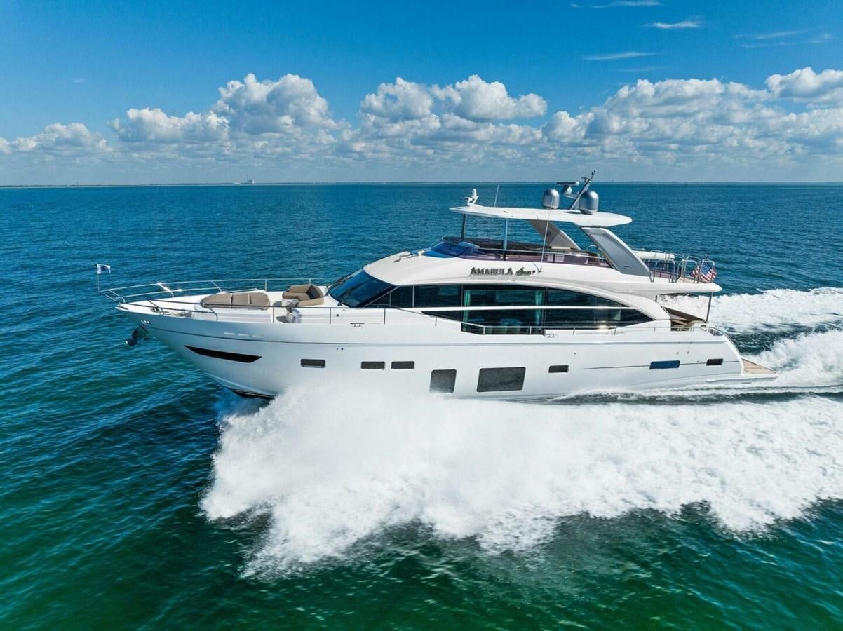 a white boat on the water aboard AMARULA SUN Yacht for Sale