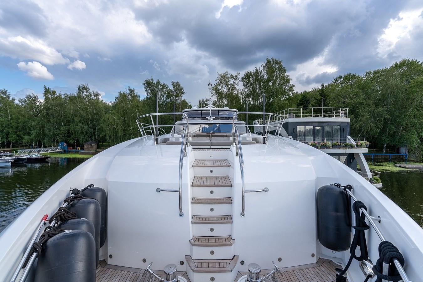 a boat on the water aboard SUNSEEKER PREDATOR 115 Yacht for Sale