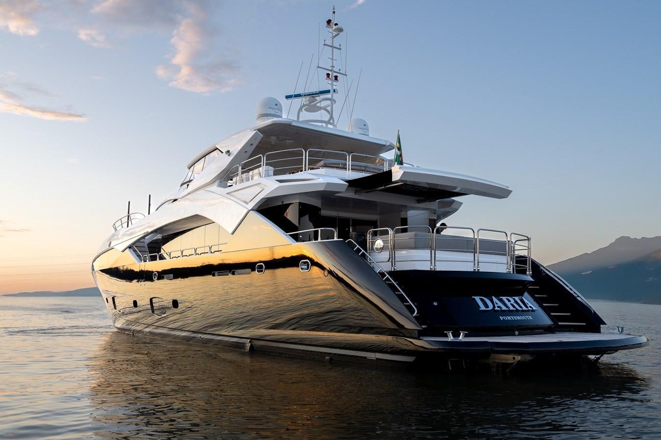 a large ship in the water aboard SUNSEEKER PREDATOR 115 Yacht for Sale