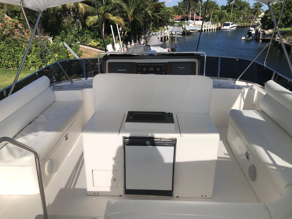 a boat on the water aboard MADNESS Yacht for Sale