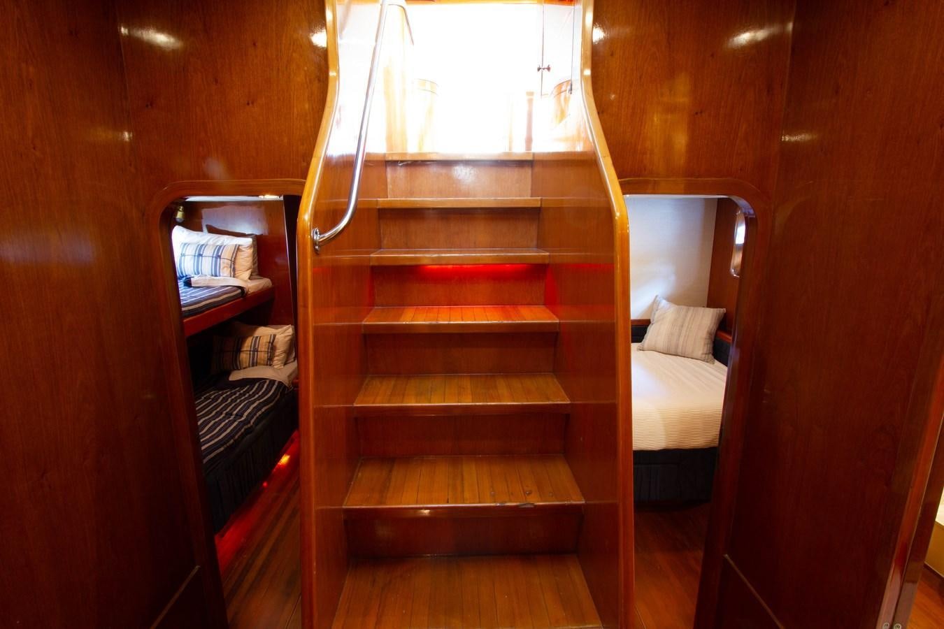 a bunk bed in a cabin aboard MADNESS Yacht for Sale