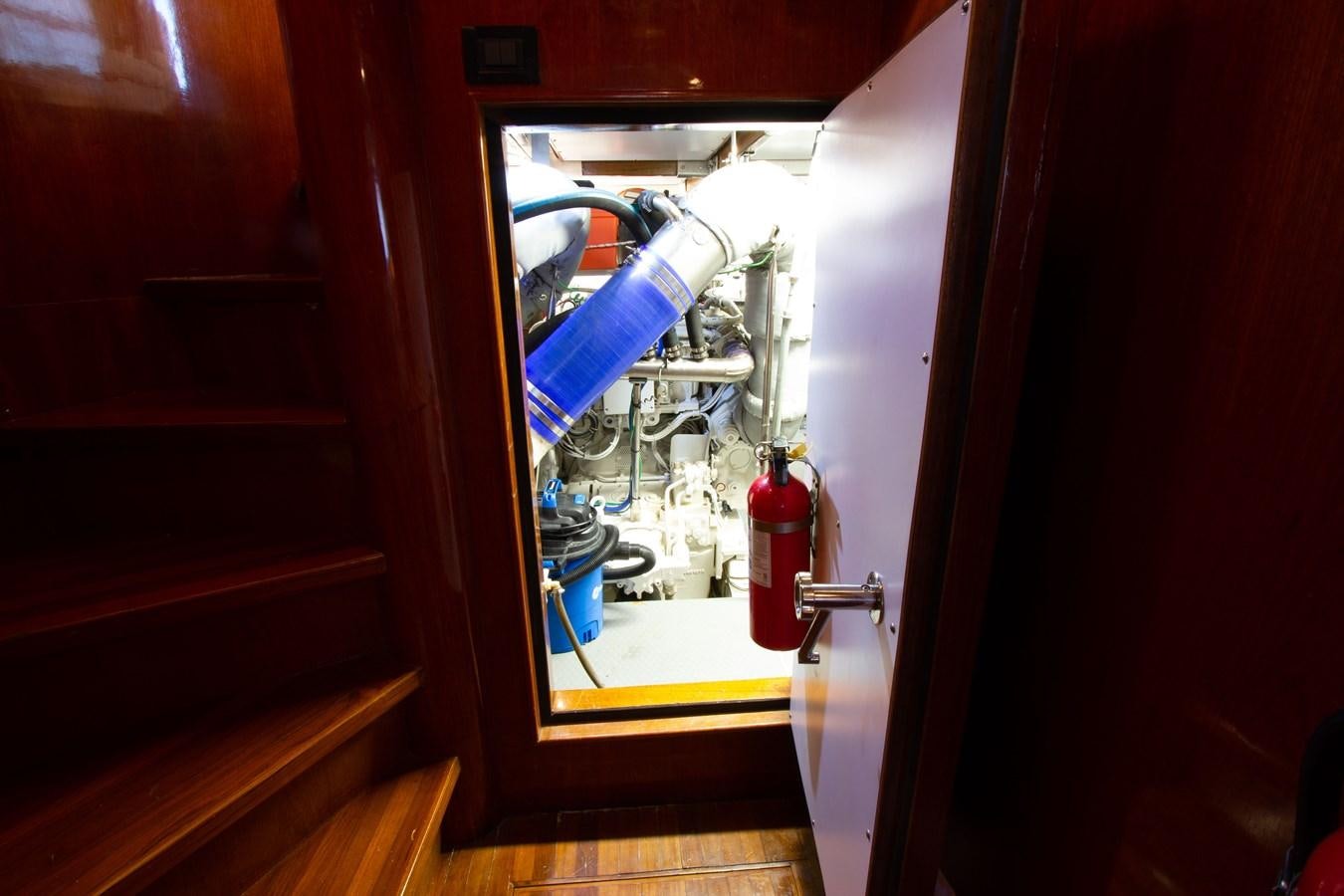 a bicycle in a closet aboard MADNESS Yacht for Sale