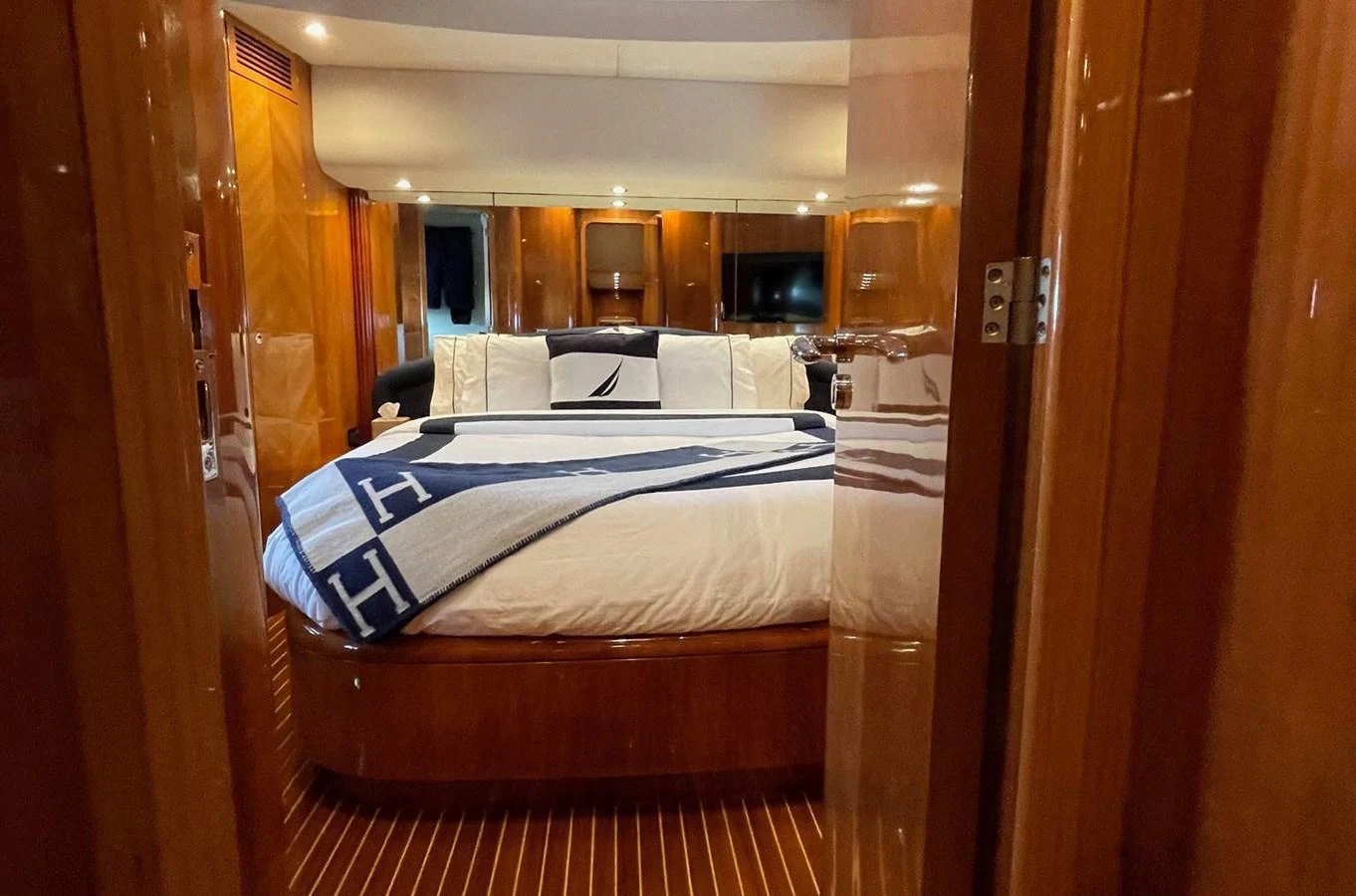 a bed in a room aboard AZIMUT 100/32 Yacht for Sale