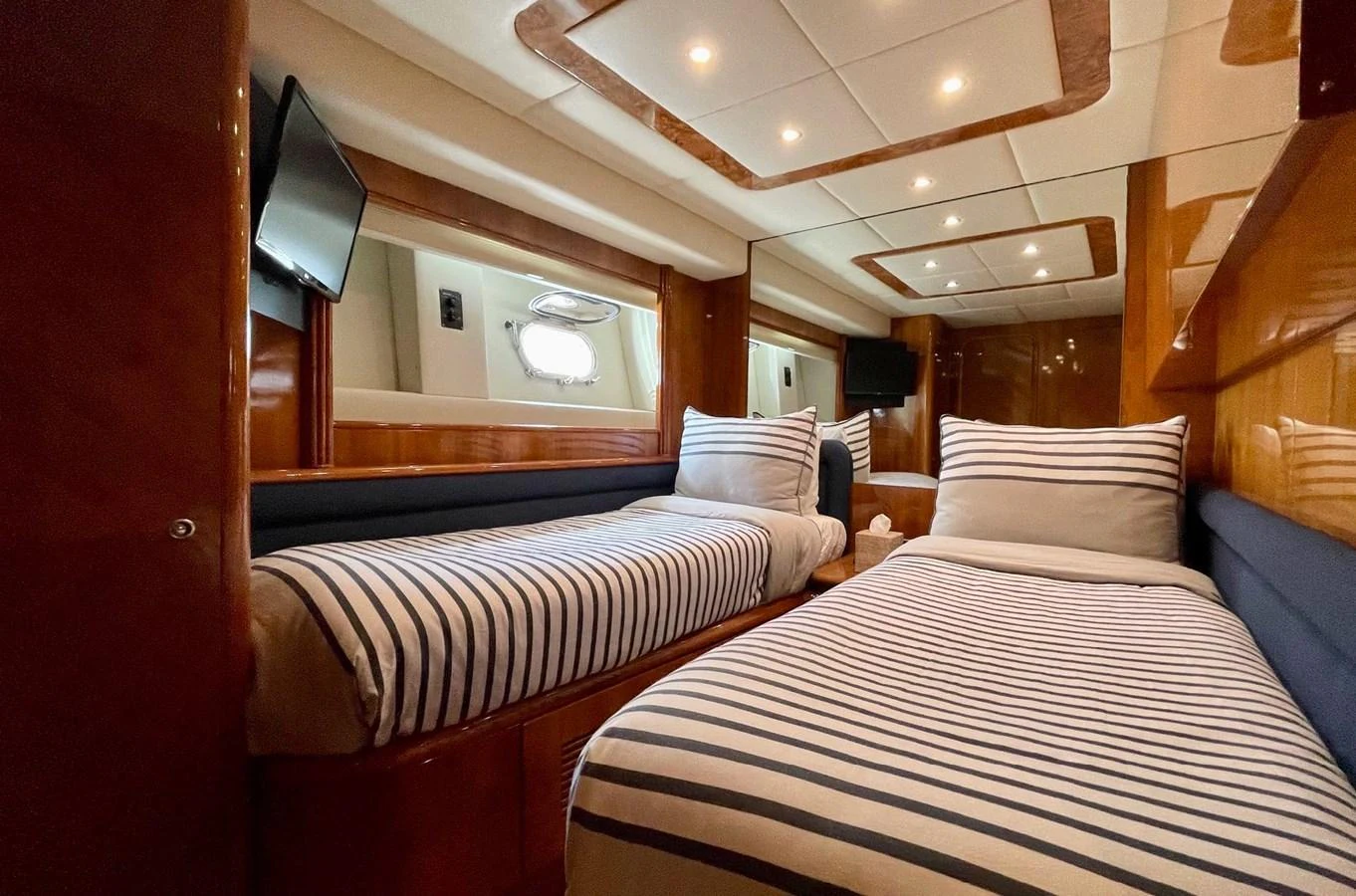 a couple of beds in a cabin aboard AZIMUT 100/32 Yacht for Sale