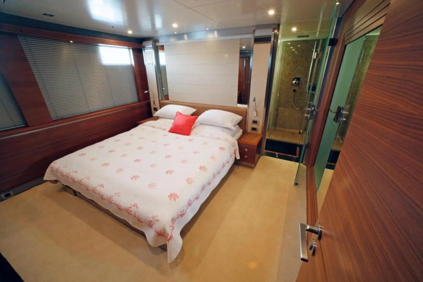 a bed in a room aboard DELETE MR MOUSE Yacht for Sale