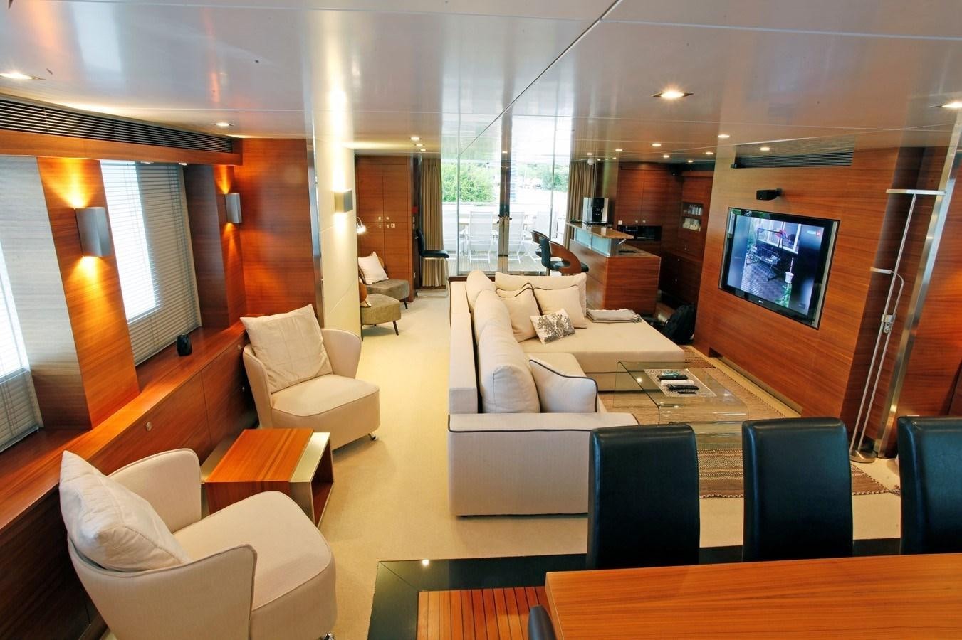 a room with a couch and a tv aboard DELETE MR MOUSE Yacht for Sale