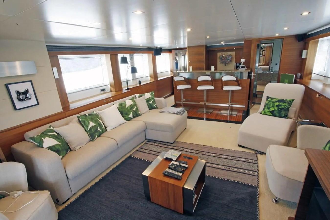 a living room with a couch and a coffee table aboard DELETE MR MOUSE Yacht for Sale